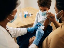 A child receiving measles vaccination