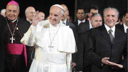 Pope Francis waving at an event