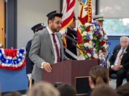 Mayor Sam Joshi speaking at a Veterans Day event in 2023.