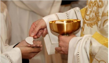 Catholics observing the Holy Communion