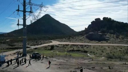 Viral Footage Shows Illegal Migrants Streaming Down California Mountainside to Cross Border