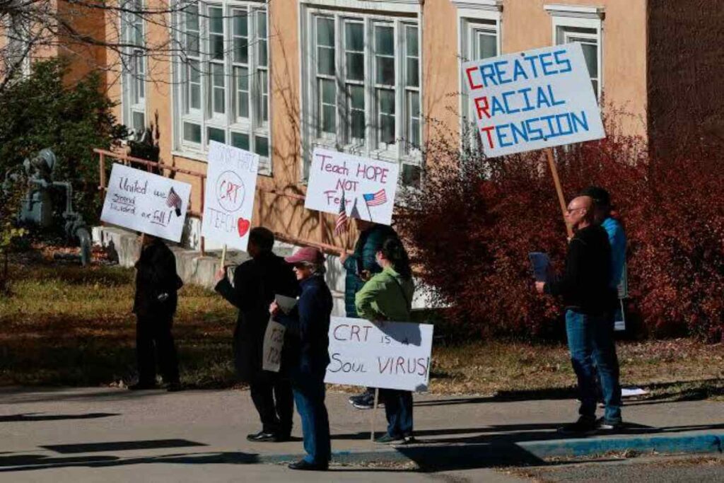 A picture of people protesting teaching slavery