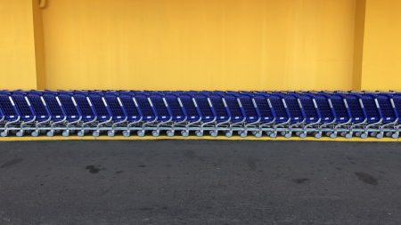 Arranged blue grocery carts