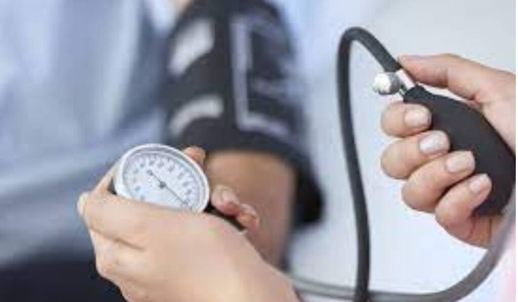 Checking high blood pressure of a patient