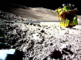 A space probe lying upside down on the Moon's surface