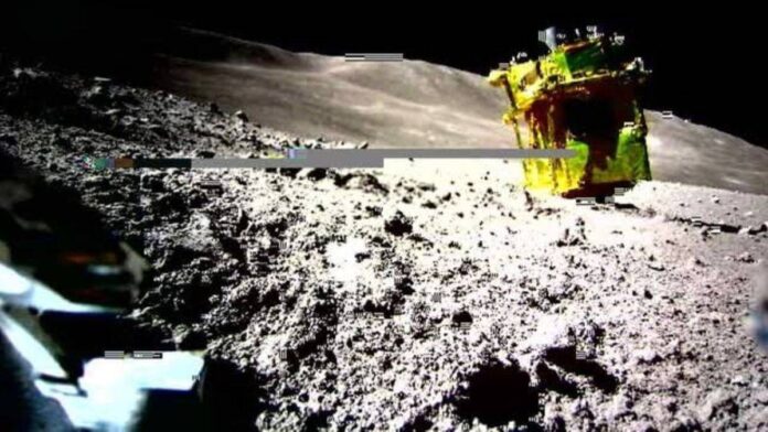 A space probe lying upside down on the Moon's surface