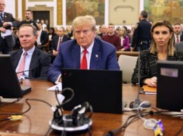 Donald Trump and his counsels sitting at a Supreme Court hearing