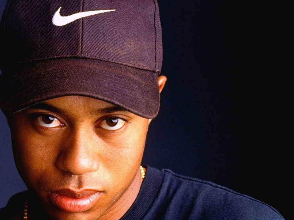 Woods dorning a Nike fez