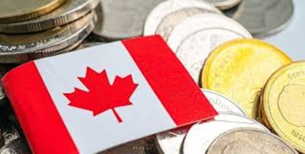 A Canadian flag lying on some coins