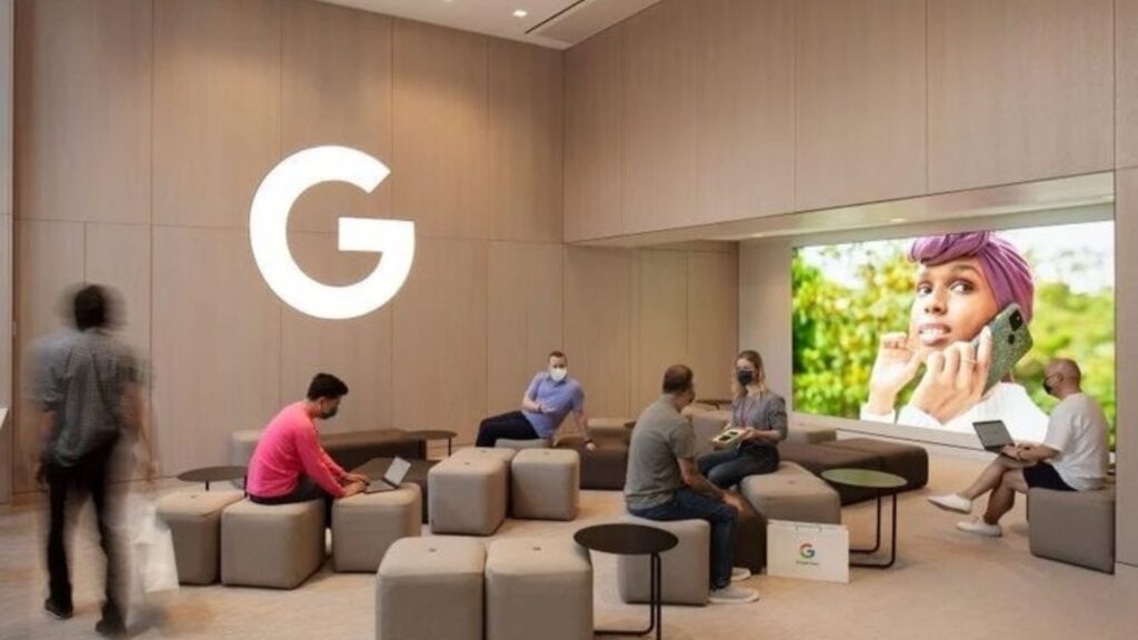 People sitting around in a room at a Google building.