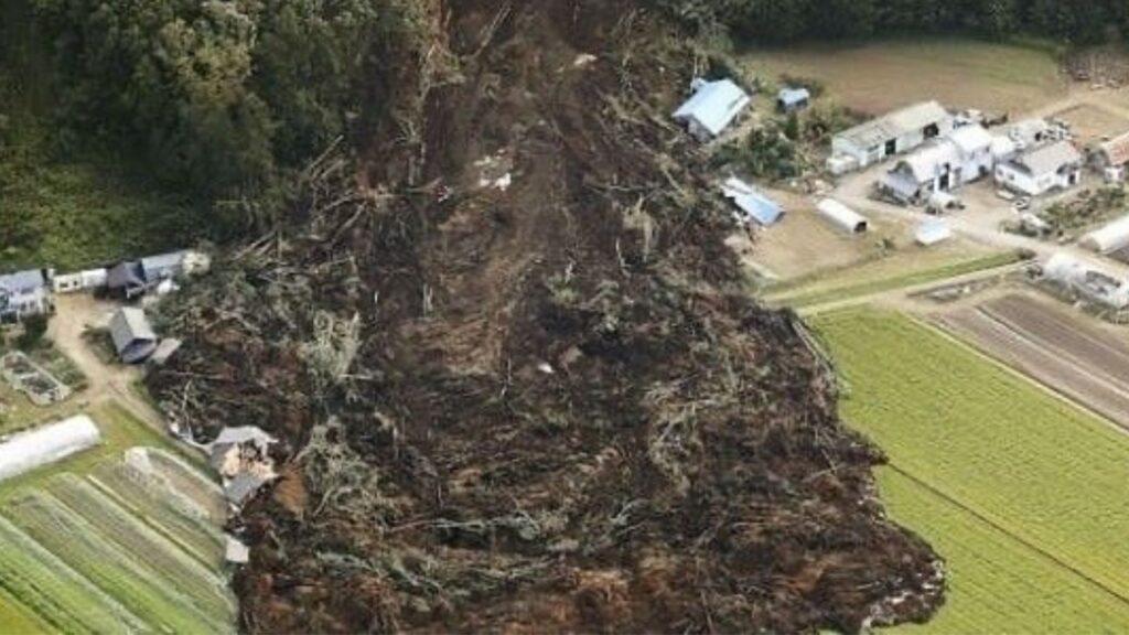 Landslide destroying some houses.