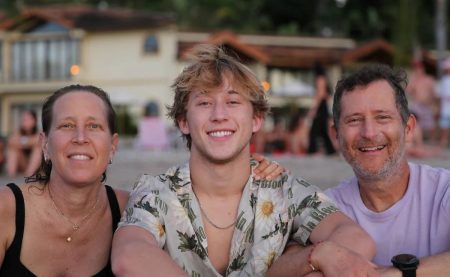 Family Photo with grandparents with trouper in the middle