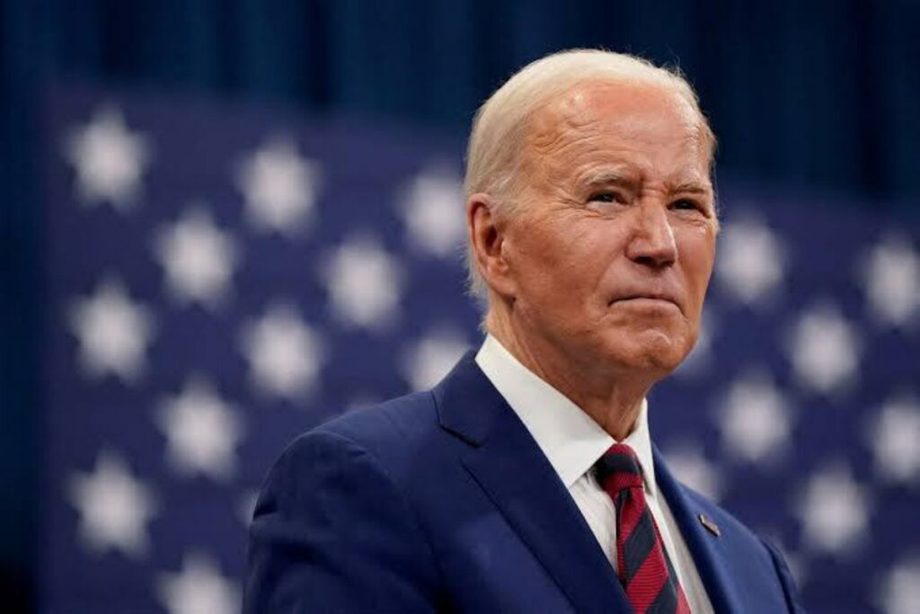 A picture of President biden who restored the Endangered Species Act