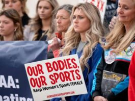 A picture of female athletes protesting transgender athletes participation