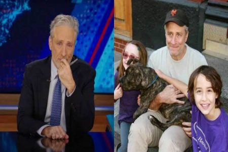 A picture of Jon Stewart with his kids and dog