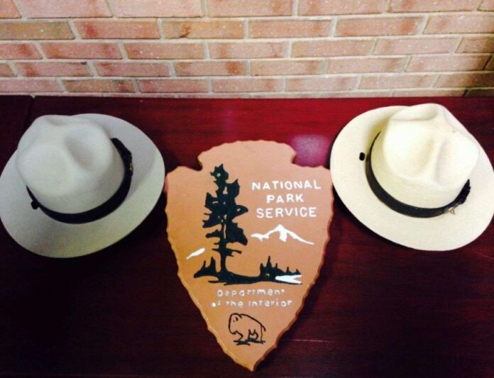 The NPS arrowhead and stetson hats