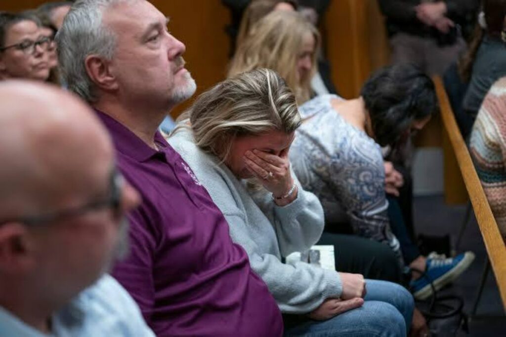 A picture of parents of the victims in court