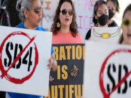 A picture of residents protesting Texas' SB4 bill