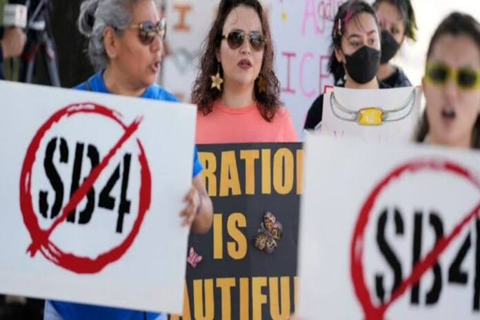 A picture of residents protesting Texas' SB4 bill
