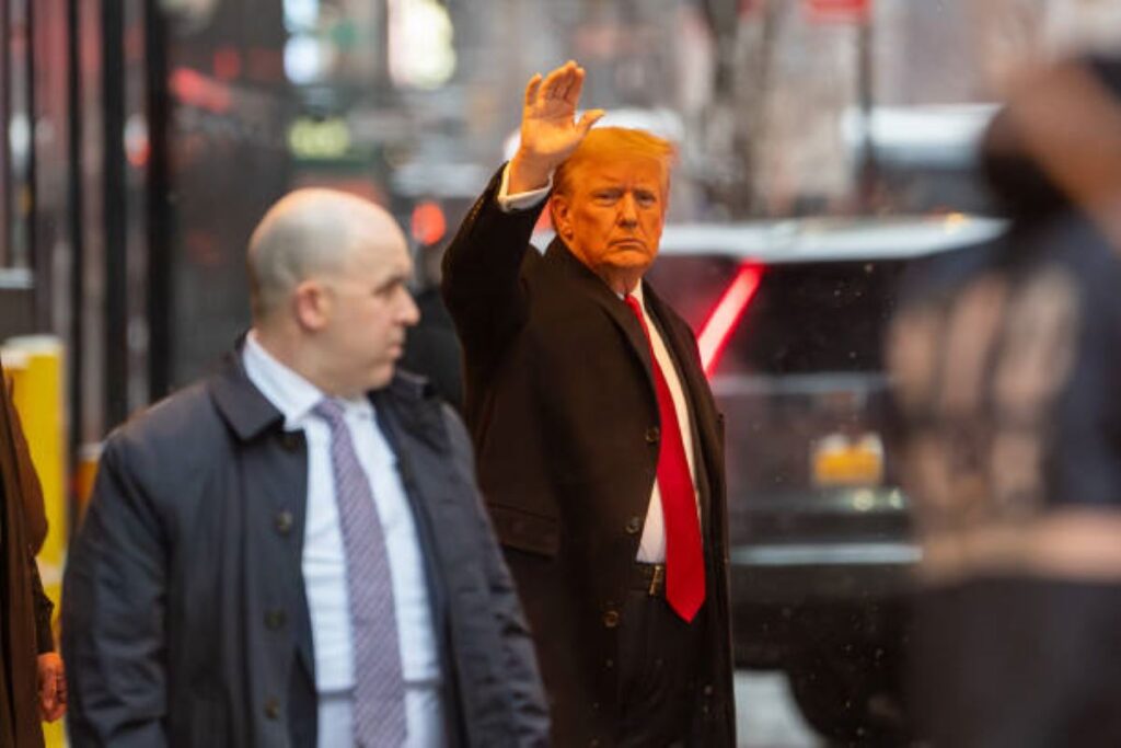 Former President Donald Trump, center, departs Trump Tower in New York, US, on Tuesday, Jan. 16, 2024.