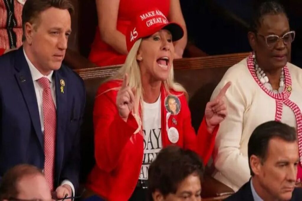 A picture of greene wearing a MAGA hat during the State of the Union.