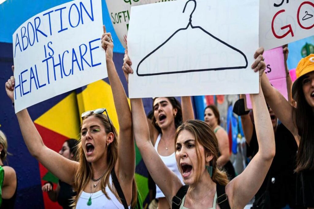 A picture of Florida abortion rights supporters protesting the right to put a state constitutional amendment protecting the right to abortion on the ballot in 2024.