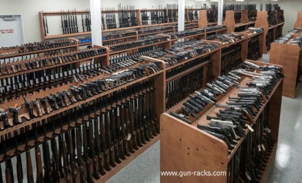 A store showing racks with various gun types