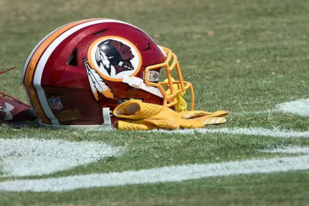 A picture of the Native American logo on the NFL team's helmet