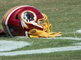 A picture of the Native American logo on the NFL team's helmet