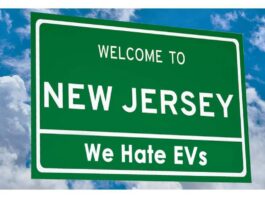 A picture of a signpost mocking the New Jersey EV tax