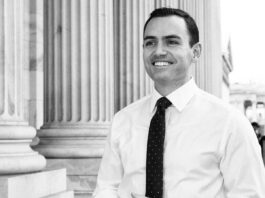 A grey scale picture of Rep Mike Gallagher