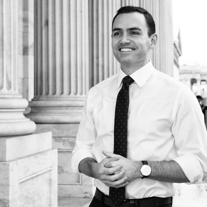 A grey scale picture of Rep Mike Gallagher