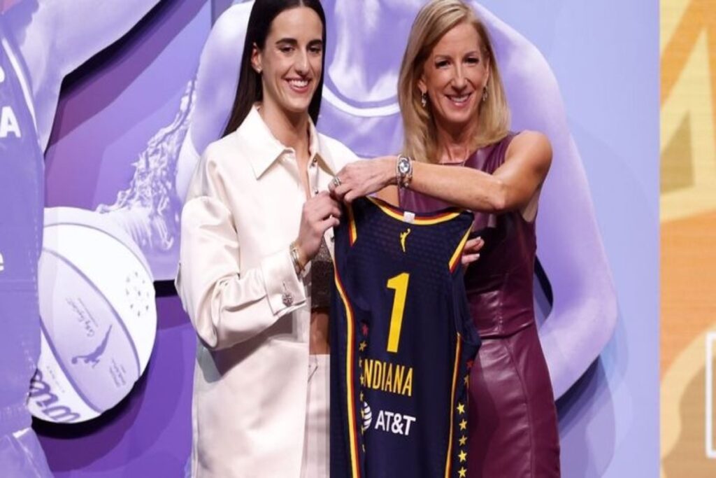 A picture of Caitlin Clark with WNBA commissioner Cathy Engelbert after she was selected with the No. 1 overall pick to the Indiana Fever
