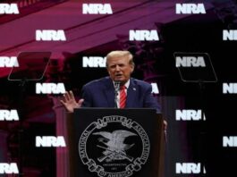A picture of Trump at the NRA meeting