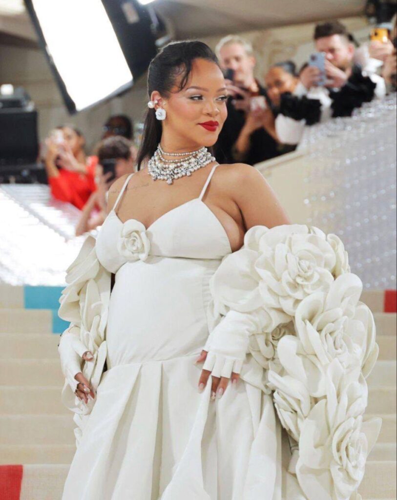 A picture of Rihanna showing off her baby bump at 2023 Met Gala