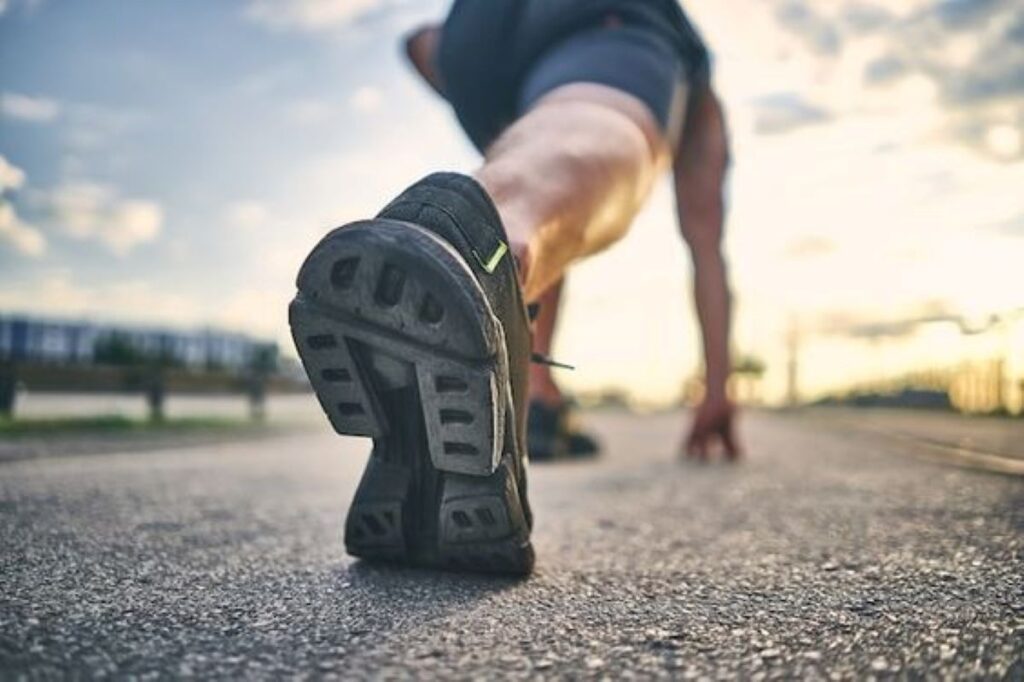 An athlete about to take off running