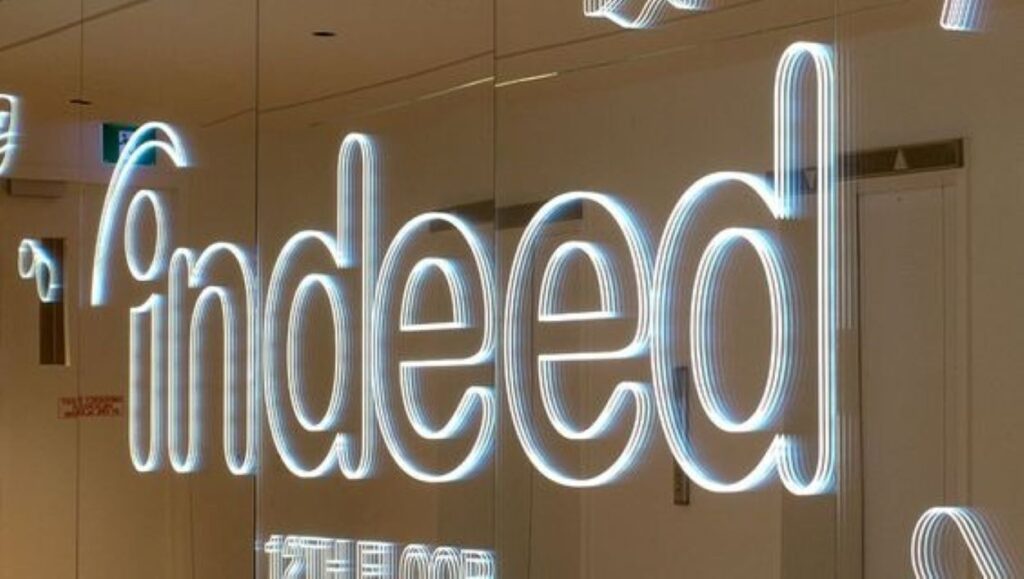 The Indeed logo fashioned into neon lights