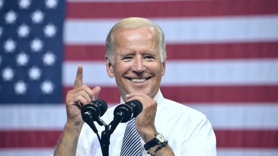Joe Biden smiling during a speech