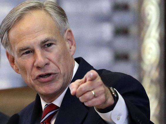 Greg Abbott the Texas governor pointing a finger at the camera