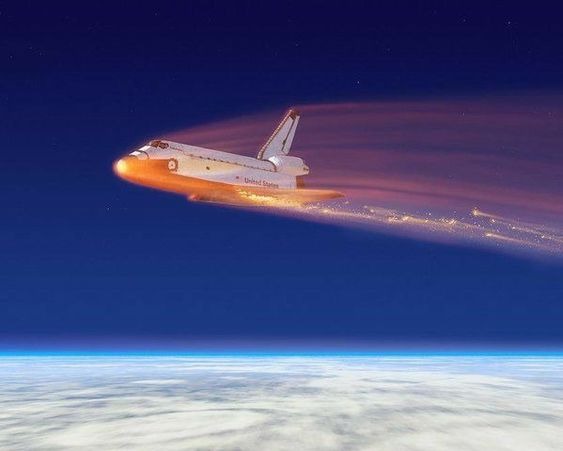 A shuttle on fire during re-entry