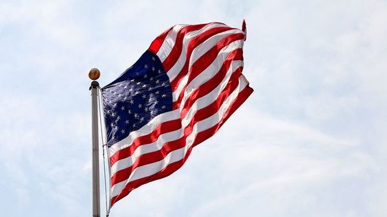 The American flag hoisted at full mast