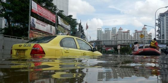 A taxi in a flooded city