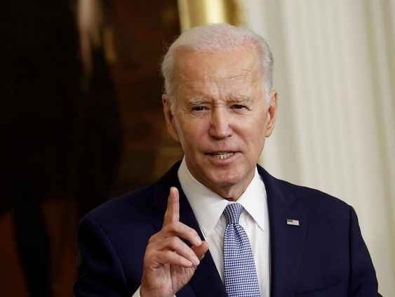 Joe Biden raising a warning finger