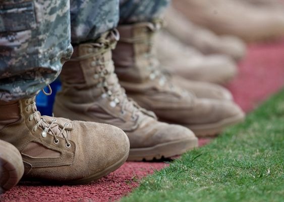 A shot focused on the feet of lined up soldiers