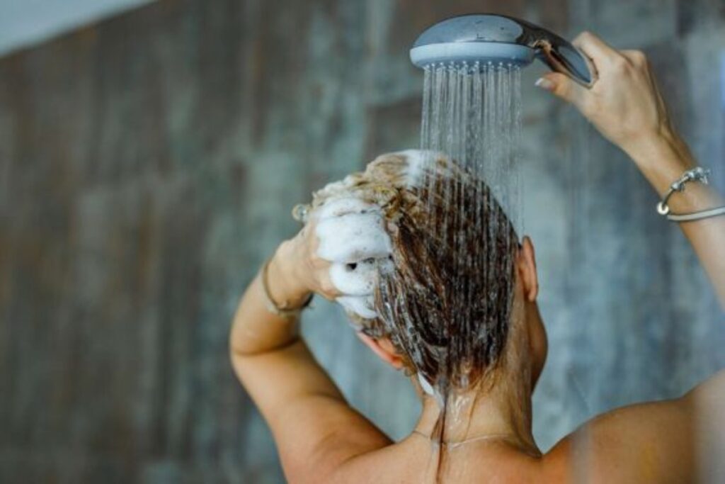 A picture of a person taking a Shower.