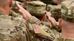 A group of soldiers saluting