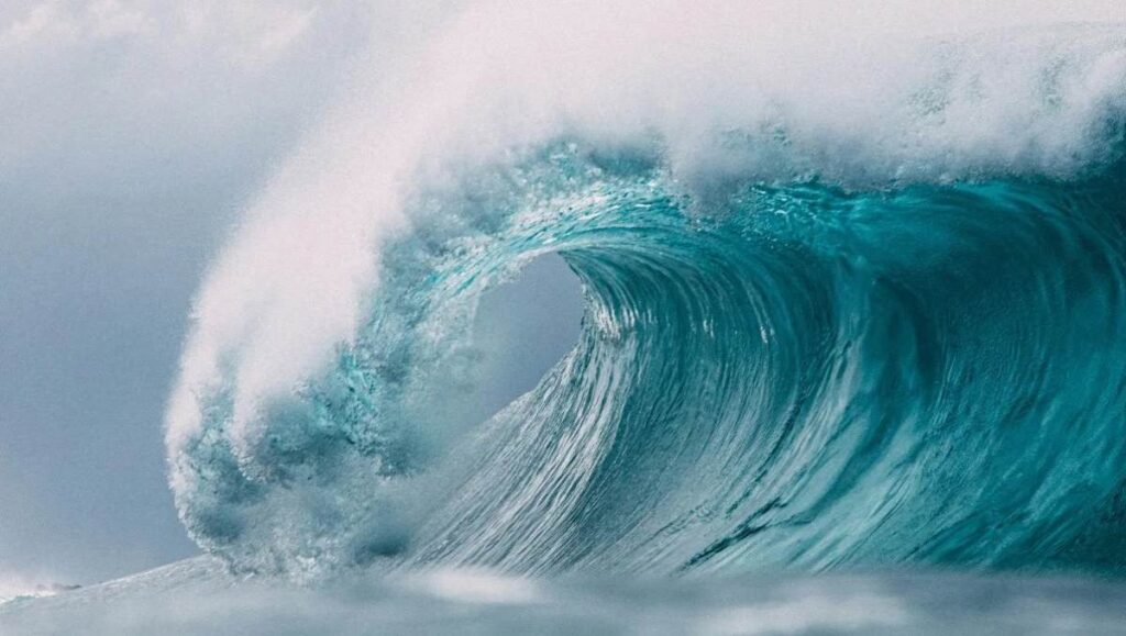 A close-up of an ocean’s wave.
