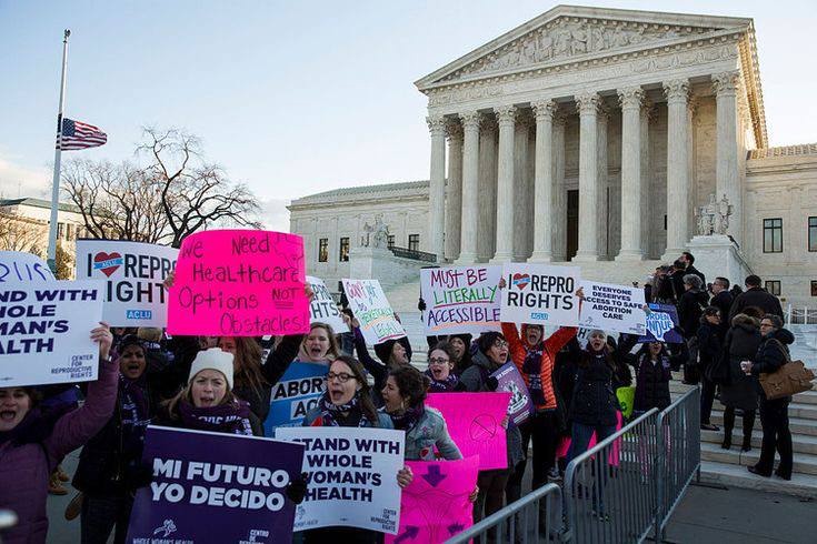 A picture of protesters at the Supreme Court