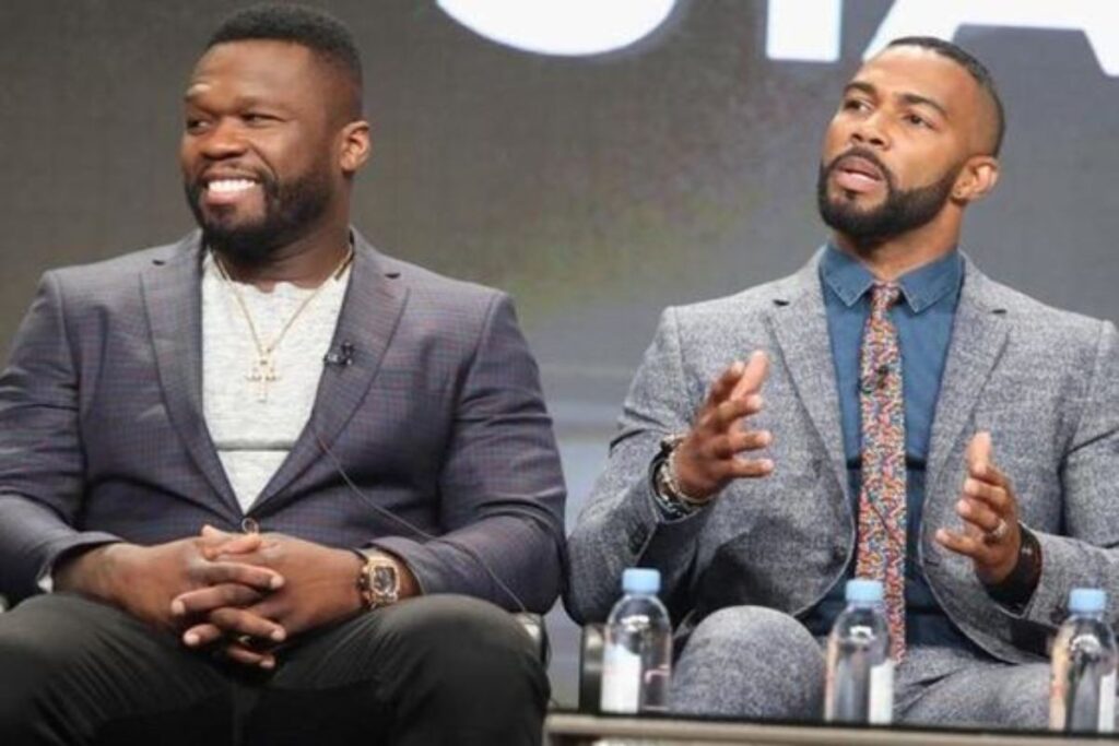 A picture of Omari Hardwick and 50 Cent.