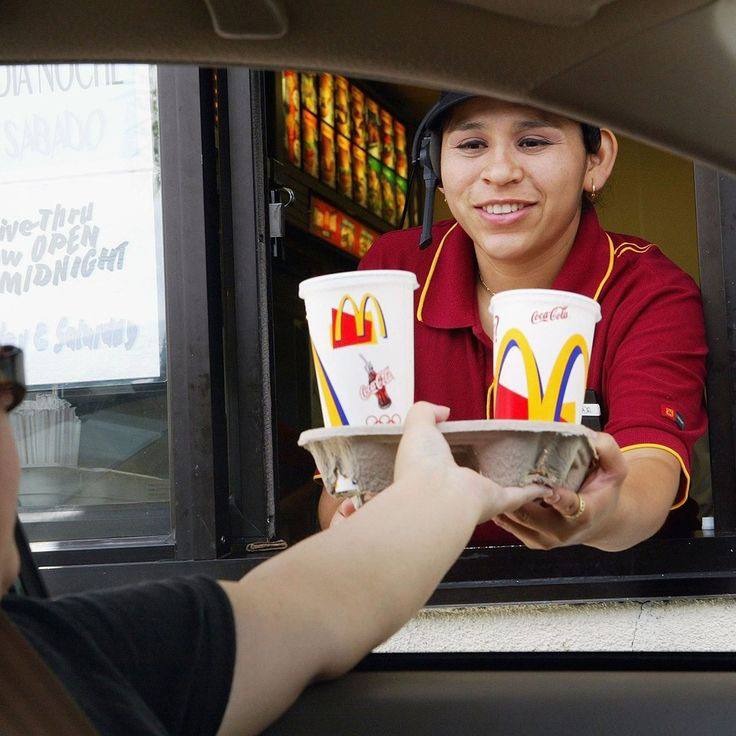 A picture of McDonald's fast food restaurant and a customer